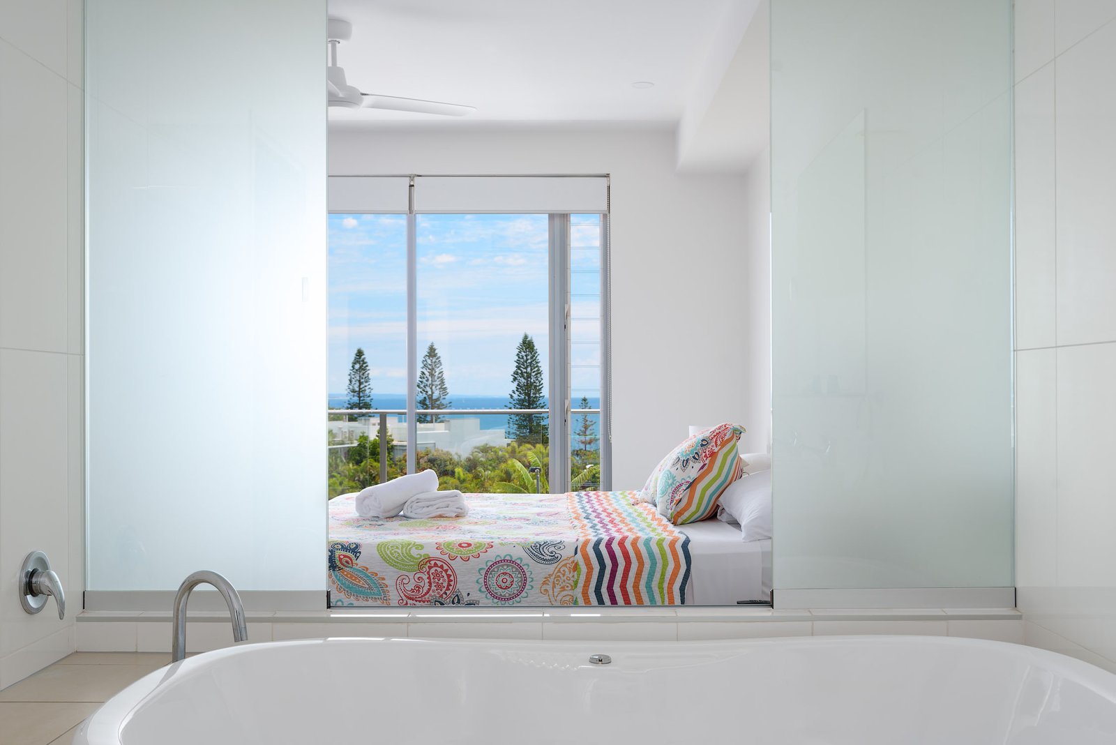 two-person spa bath, which overlooks the bedroom and offers an enchanting view of the ocean at Rainbow Beach