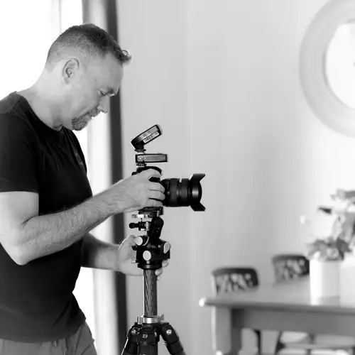 Action profile BW 500x500px Action shot of Bernie taking a photo